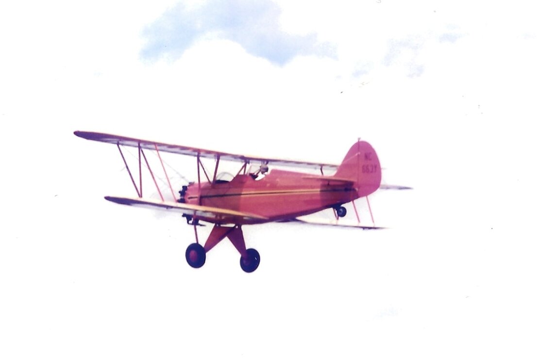 Vintage biplane in flight